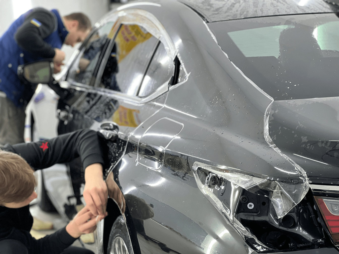 Wrapping a car with a protective film